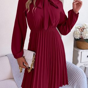 Autumn and winter temperament tie waist long sleeve pleated skirt