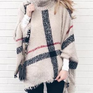 Mid-length high collar tassel cape loose knitted sweater