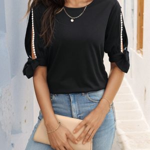 Women's black top with hollow shoulders