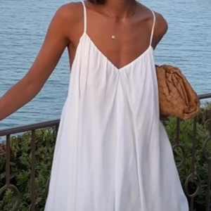 New women's fluffy pleated hem sexy backless V-neck sleeveless suspender dress